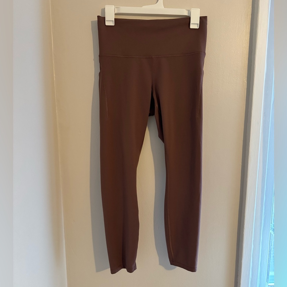 Lululemon Wunder Train High Rise Tight with Pockets 25” Size 10 in Dark Oxide
